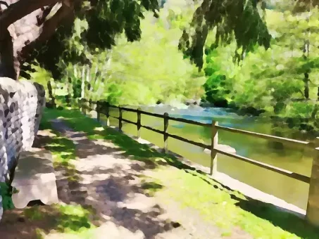 Cette belle allée longe agréablement la rivière