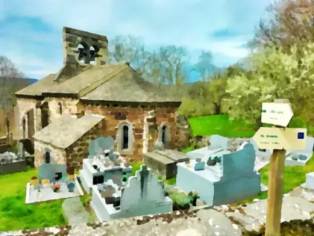 L'église avec le fléchage de la Via Arverna au premier plan