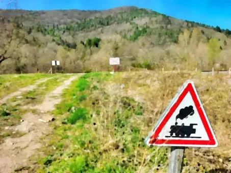 Et oui, ce panneau existe toujours : passage à niveau sans barrière !